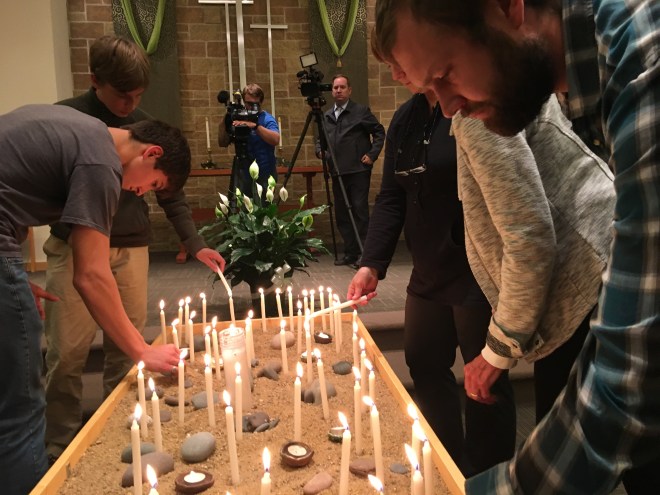 Nathan, etc. lighting candles